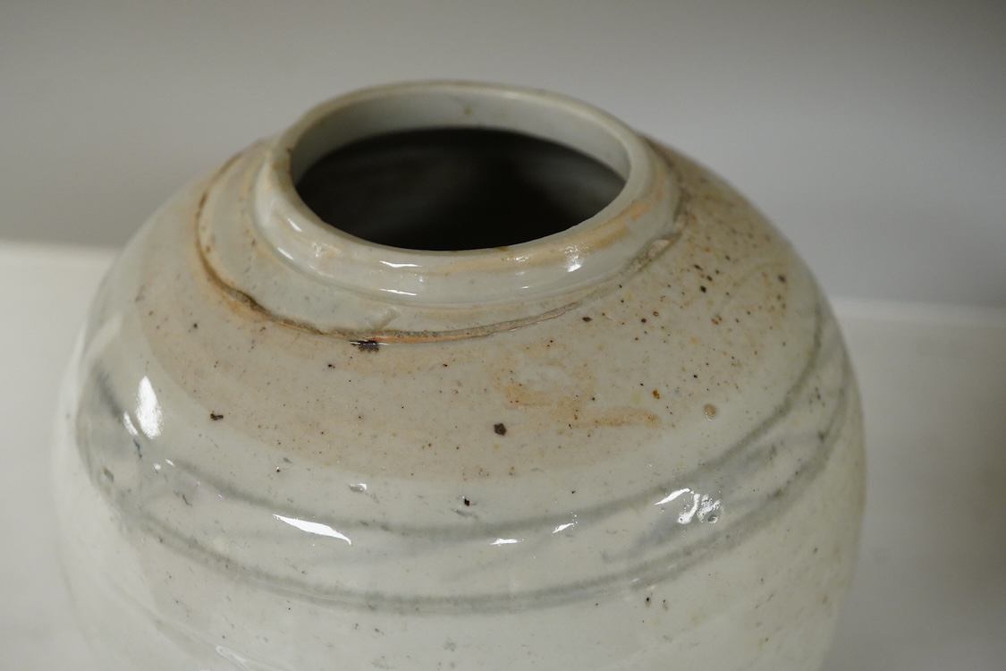 A 19th Century Chinese blue and white ‘precious objects’ plate, a jar and famille rose saucer, largest 23cm in diameter